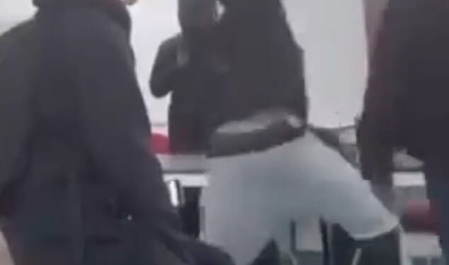 A video circulating on social media allegedly shows the terrifying moment a boy pulls a machete from his trousers and wildly swipes the blade at a student