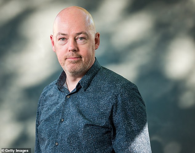 Famed Irish writer John Boyne, 54, has said his literary peers have tried to 'cancel' him over his views on transgender issues - but book sales have only gone up