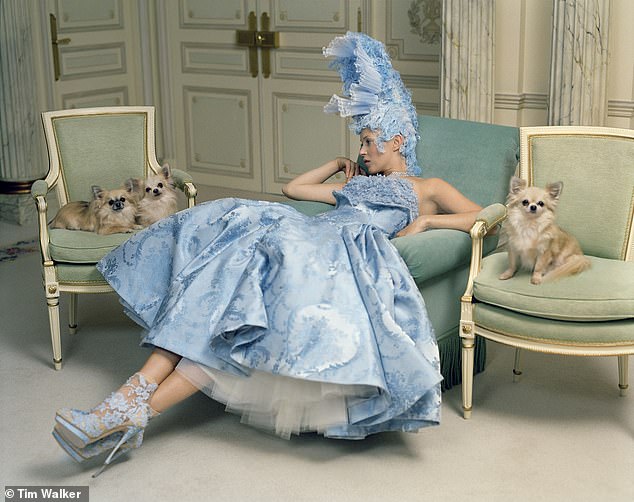 Among the exhibits is a 2012 photograph of Kate Moss, styled by Sarah Burton for Alexander McQueen, posing as France's last Queen, with a trio of chihuahuas around her, at The Ritz in Paris