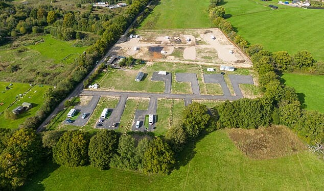 A small hamlet has launched a fight against a series of 'illegal' traveller sites, built on field land without planning permission (pictured)