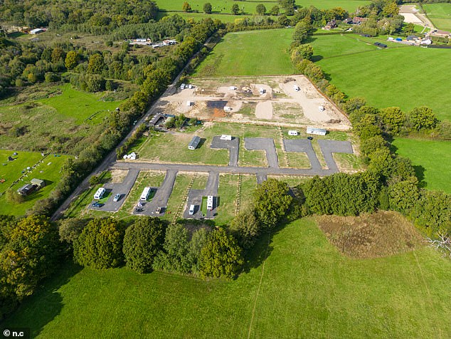 A small hamlet has launched a fight against a series of 'illegal' traveller sites, built on field land without planning permission (pictured)