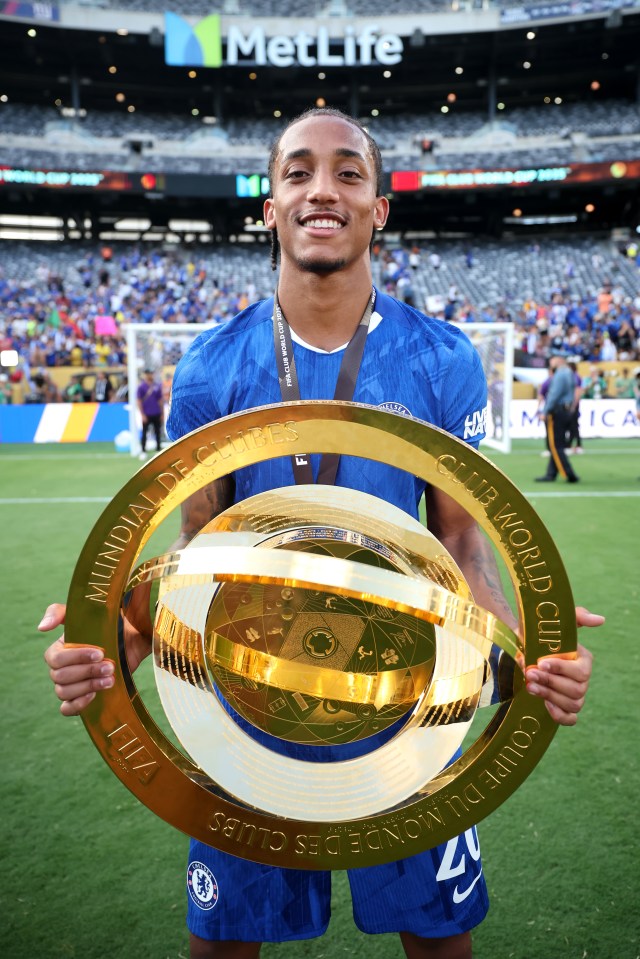 Joao Pedro holding the FIFA Club World Cup 2025 trophy.