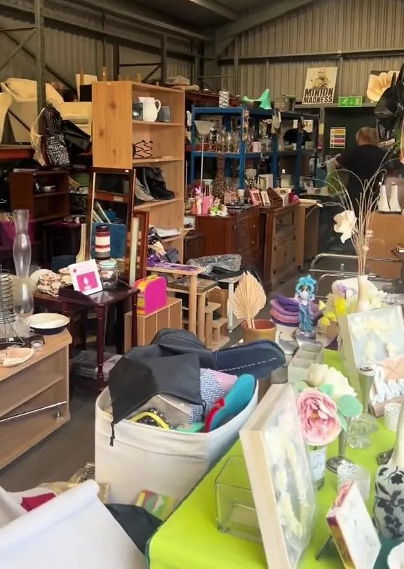 Interior of a Port Talbot shop filled with various secondhand items.