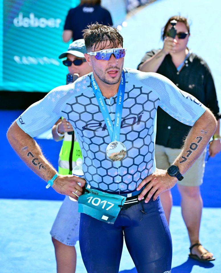 Tommy Fury at the finish line of the French Riviera T100 Triathlon.