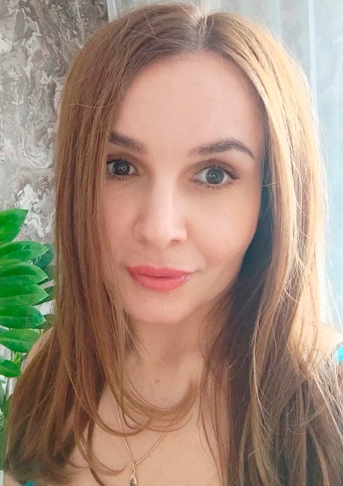Headshot of Linariya Muzipova, a 42-year-old woman with light brown hair, wearing a necklace with a teardrop-shaped pendant.