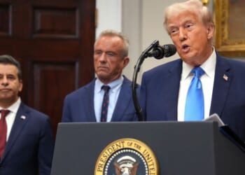 President Donald Trump, right, accompanied by Health and Human Services Secretary Robert F. Kennedy Jr., center, and Food and Drug Administration Commissioner Dr. Marty Makary, left, delivers an announcement on “significant medical and scientific findings for America’s children” in the Roosevelt Room of the White House in Washington, D.C., on Monday.