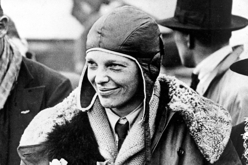 Amelia Earhart poses for photos after her transatlantic flight.