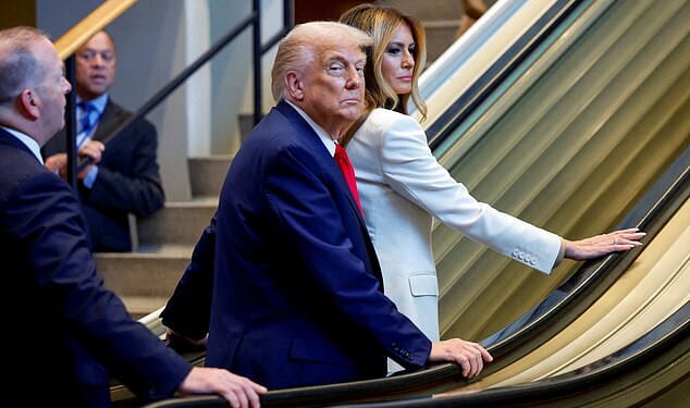 President Donald Trump (left) and First Lady Melania Trump (right) got stuck on a broken escalator and had to walk up the metal stairs when arriving at the UN General Assembly ahead of the president's address Tuesday morning