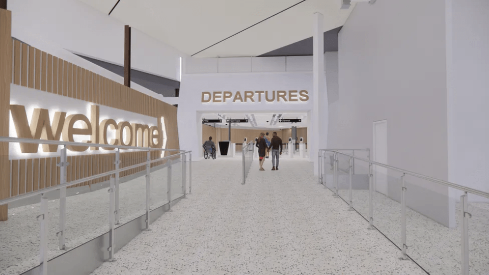 Illustration of the East Midlands Airport terminal interior with "Welcome" and "Departures" signs.