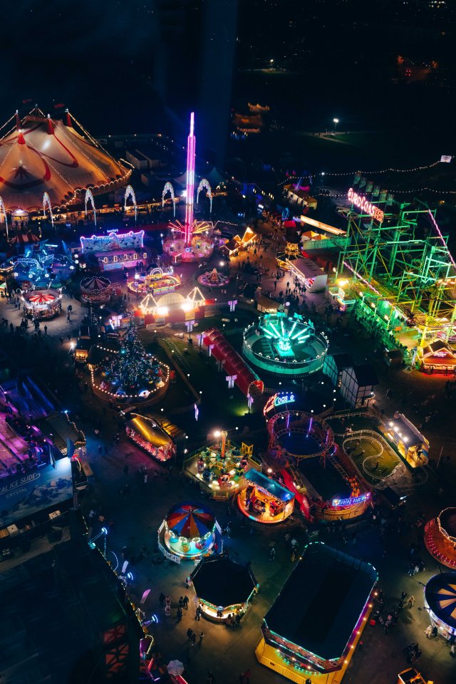 Aerial view of Hyde Park Winter Wonderland at night.