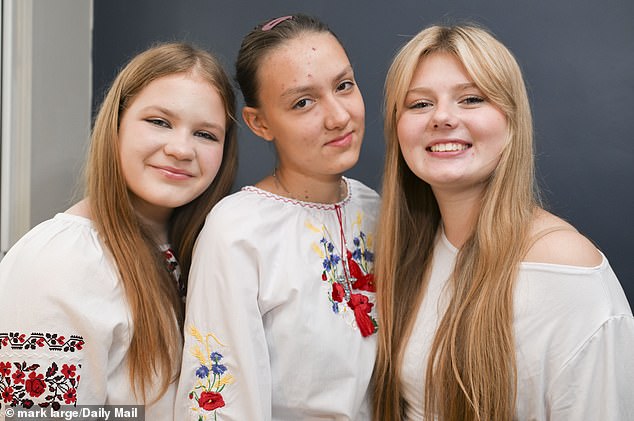 Maria Tieterina, Victoria Syzonova and Dasha Kuzhietsova, who are 14-year-old Ukrainian 'children of heroes' on a rehabilitation visit to Britain funded by generous Daily Mail readers