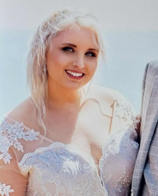 Bride in lace wedding dress.