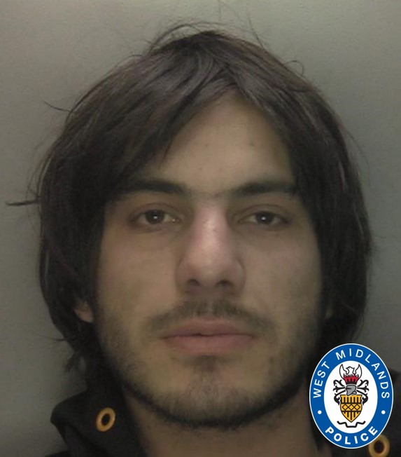 Mugshot of Asad Khan.