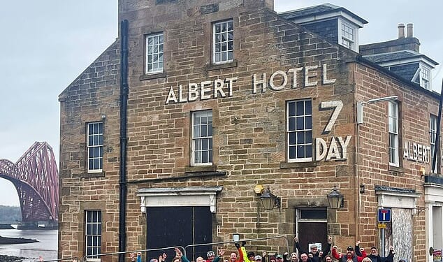 Supporters of the North Queensferry community bid to use the Scottish government's new land reform laws to force the owners of the Albert Hotel to sell the hotel to them