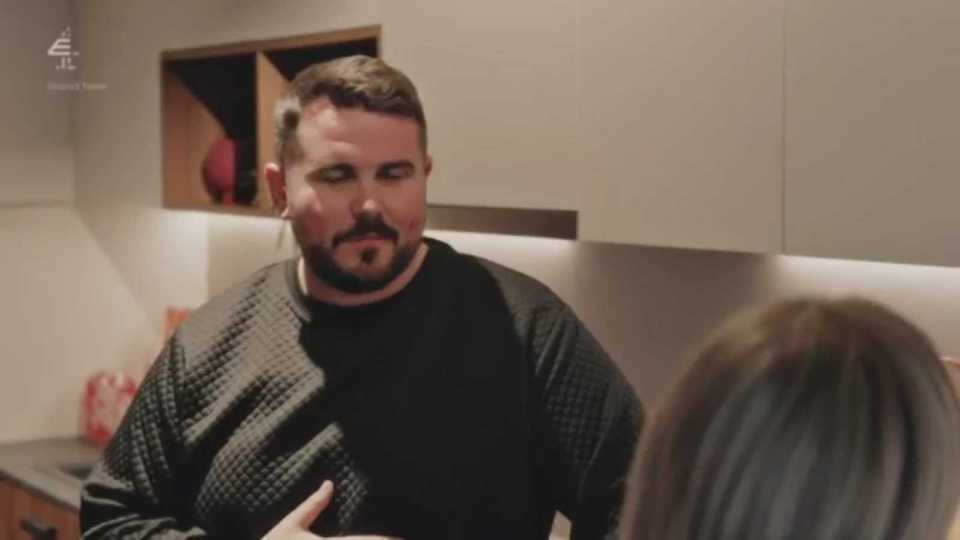 Dean talking to Sarah.