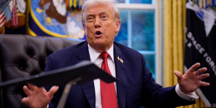President Donald Trump speaks in the Oval Office of the White House in Washington, D.C., on Thursday.