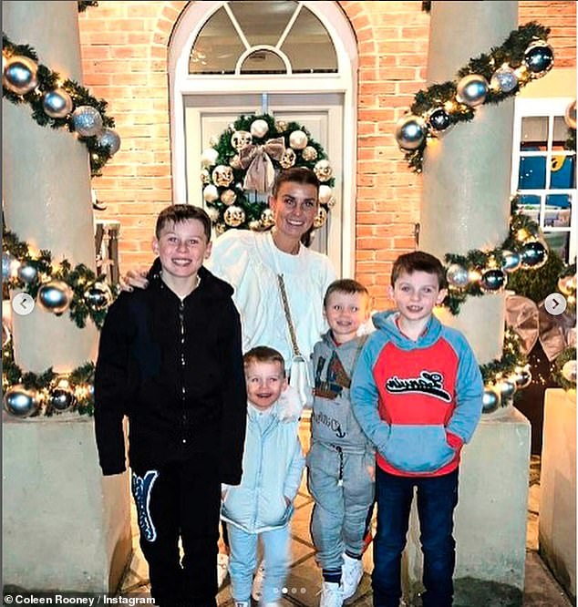 Coleen pictured with her four sons - (L-R) Kai, Cass, Kit and Klay at Christmas time