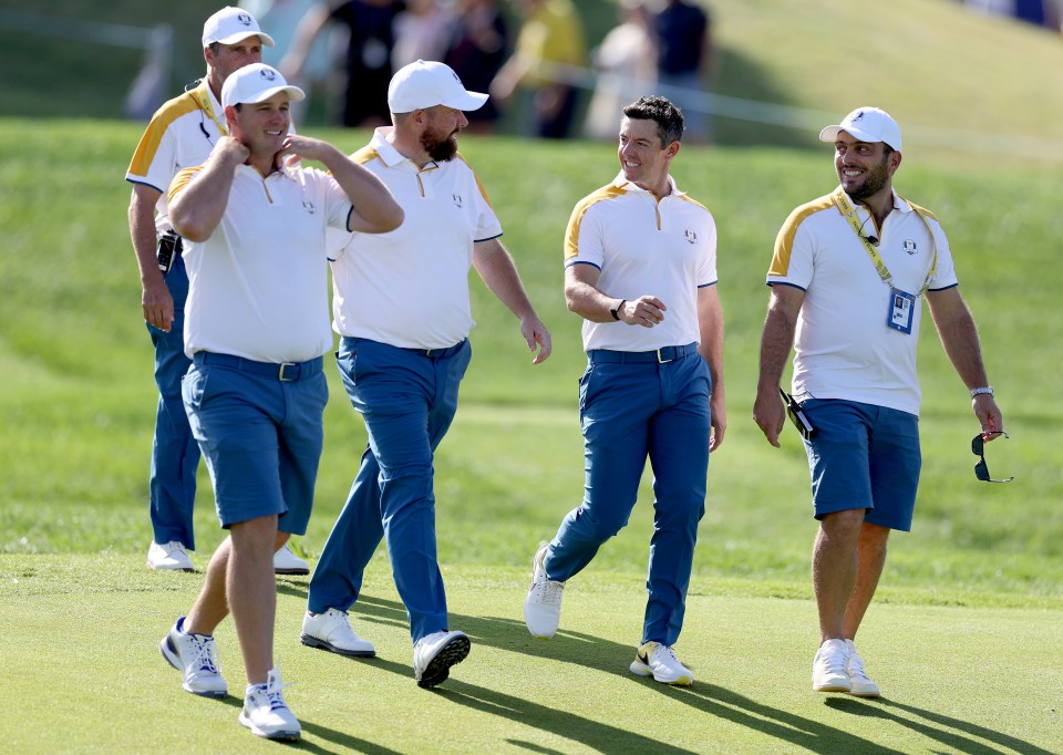 Sepp Straka, Shane Lowry, Rory McIlroy, and Francesco Molinari talking during a practice round at the 2023 Ryder Cup.