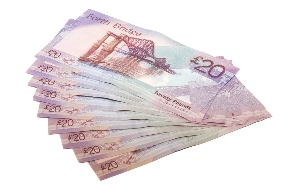 Fan of twenty-pound notes featuring the Forth Bridge.