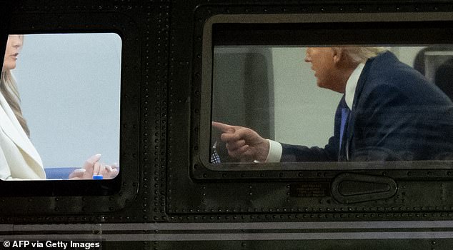 At one point the president was seen waving a finger at his wife and the first lady shaking her head