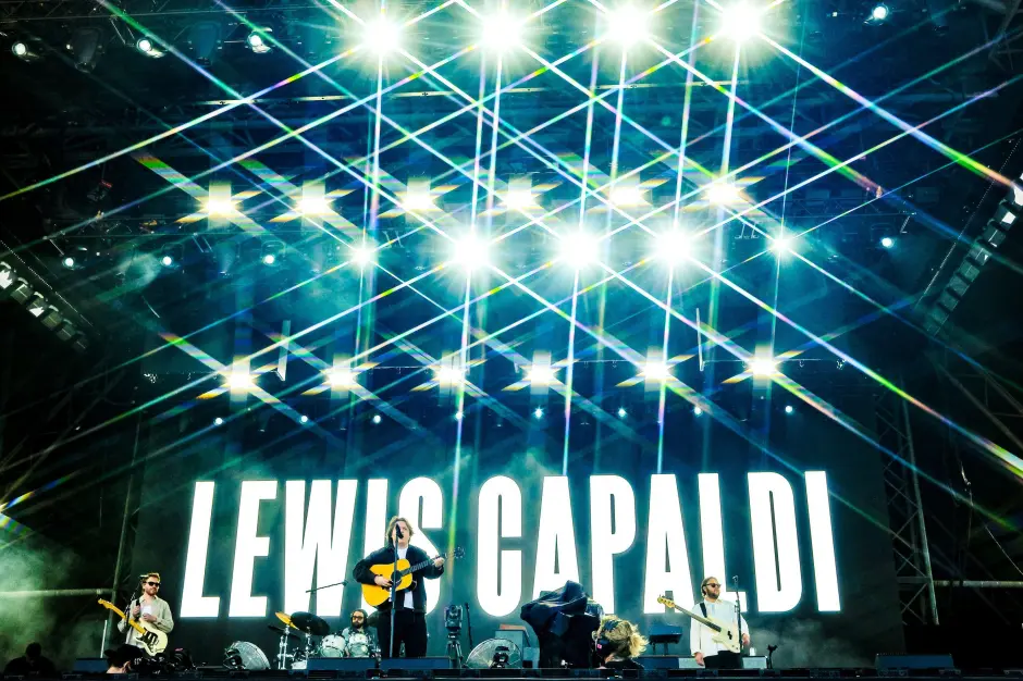 Lewis Capaldi performing on stage.