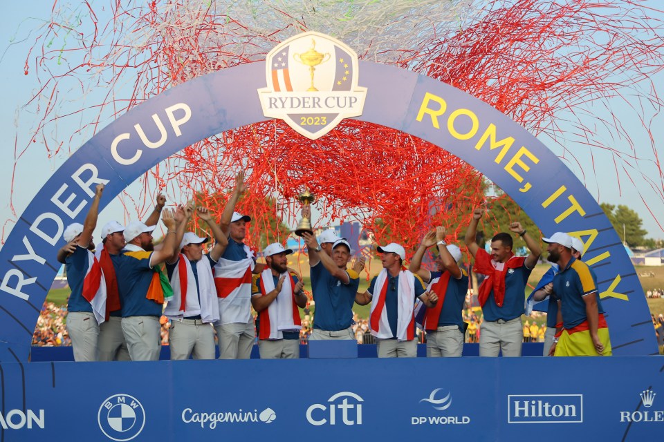 Shane Lowry of Europe celebrates with Rory McIlroy and teammates after winning the Ryder Cup.