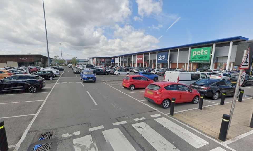 GV Cleveland Retail Park parking lot with several shops visible.
