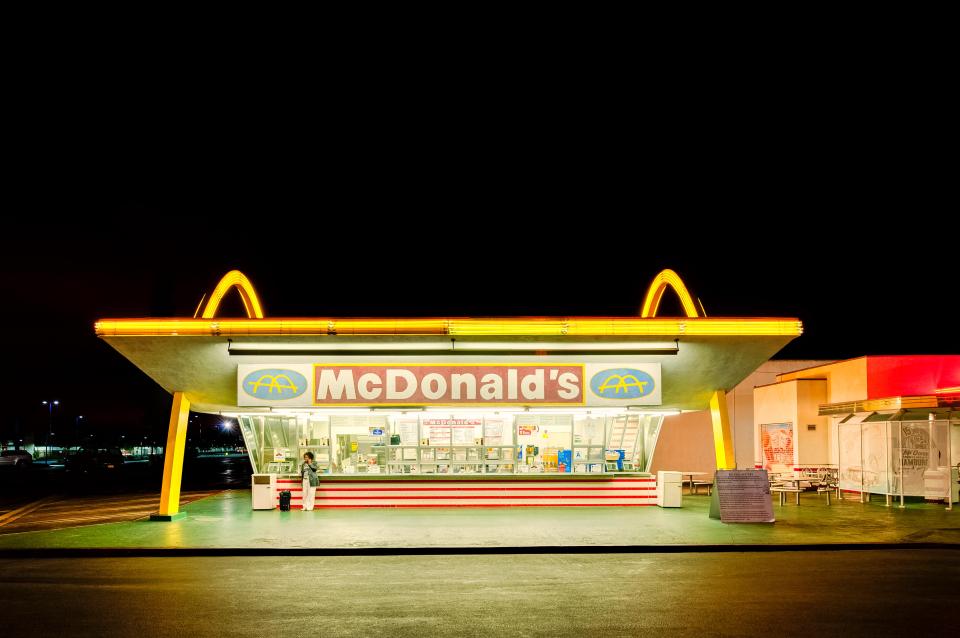 Nighttime photo of the third McDonald's restaurant in Downey, California.