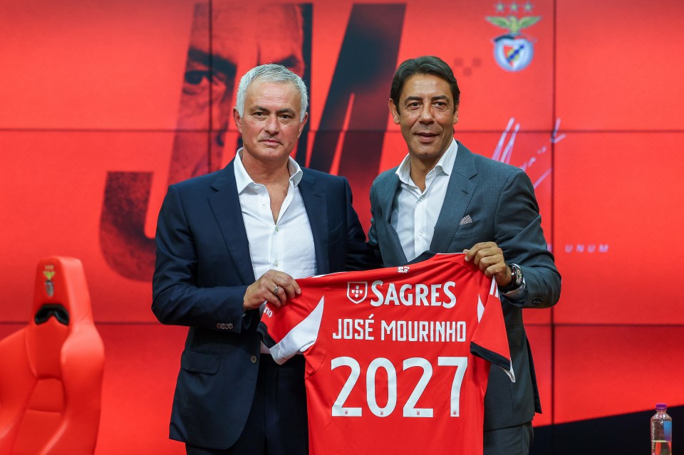 Jose Mourinho and SL Benfica president Rui Costa pose with a jersey, announcing Mourinho as the new head coach.