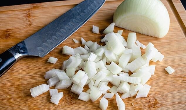 Offering his words of culinary wisdom, Ian Sutton, chef lecturer at Capital City College, has revealed the lesser-known trick for onion dicing that won't leave you in tears (stock photo)