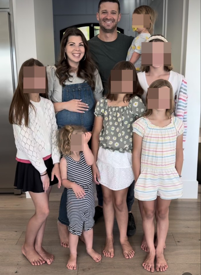 Family photo with faces blurred.