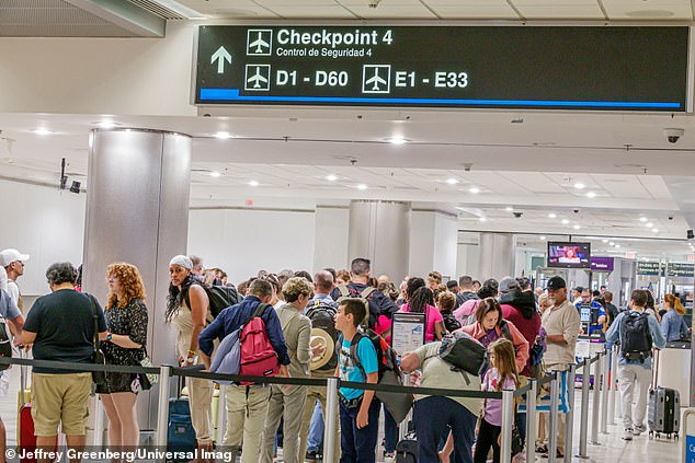 Miami, Florida, Miami International Airport, crowds of people security screening TSA checkpoint (file photo)