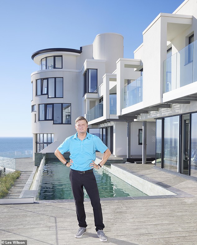 Edward Short is pictured at Chesil Cliff House on the north Devon coastline, which featured on Grand Designs