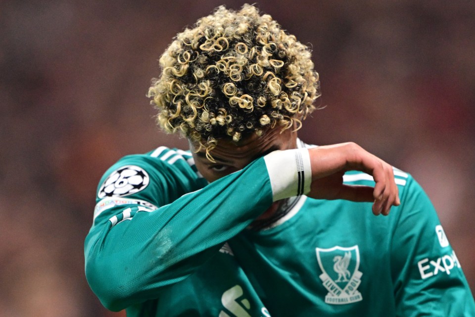 Liverpool's French forward Hugo Ekitike reacts after suffering an injury.