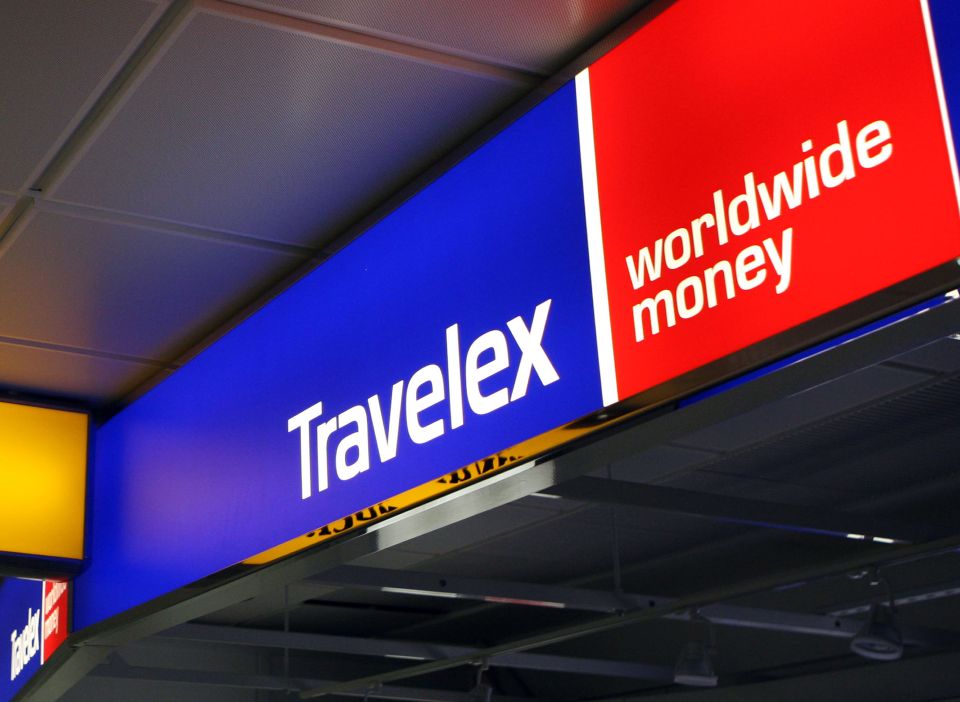 Travelex and Worldwide Money signs at Heathrow Airport.