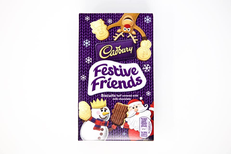 Cadbury Festive Friends Biscuits box with illustration of a snowman, Santa, and reindeer.