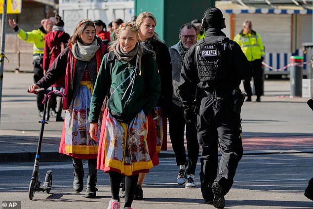 A police officer walks at the Oktoberfest area that stays closed after a bomb threatening in Munich on October 1, 2025