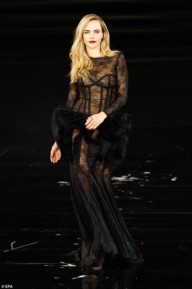 Beaming and waving to an audience of thousands in the grounds of the Eiffel Tower, Cara looked the epitome Hollywood glamour as she graced the coveted PFW L'Oréal catwalk on Monday