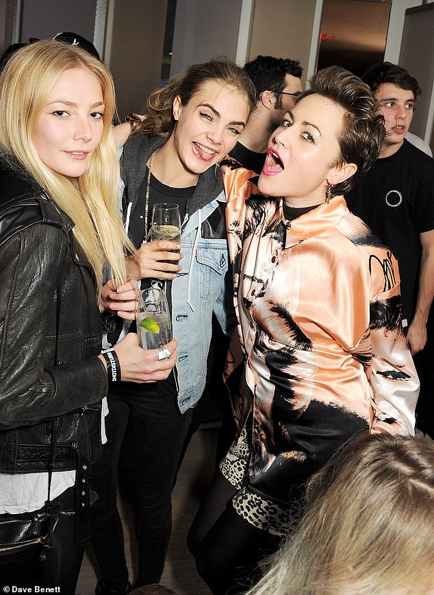 Seen with pals Clara Paget and Jaime Winstone partying up a storm in 2012