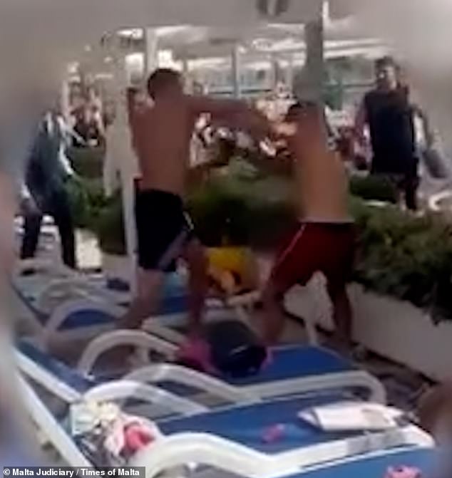 A British tourist is facing court charges after a man he punched during a booze-fuelled poolside brawl at a Maltese hotel died from an unrelated brain aneurysm