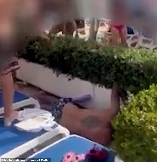 Footage shows one of the men lying unconscious on the ground after the altercation