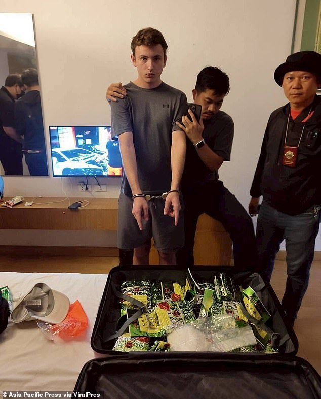 Officers swooped on the hotel room at Le Fenix on Sukhumvit Soi 11 and arrested George
