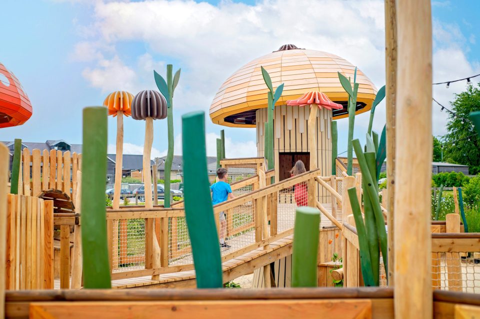 Children playing in Jack's Yard, an indoor and outdoor attraction at Fairytale Farm.