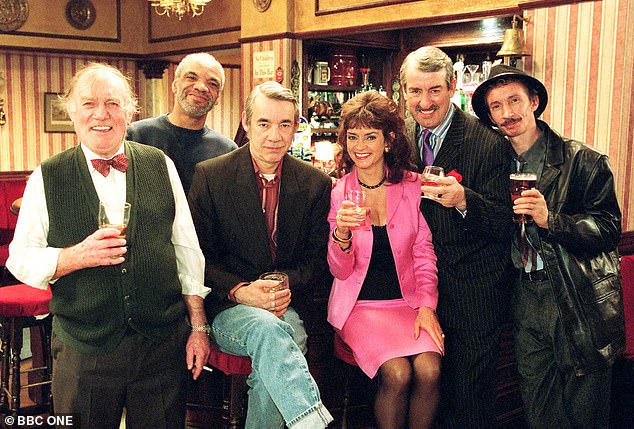 Murray, pictured right, with the cast of the show during a 2001 Christmas special