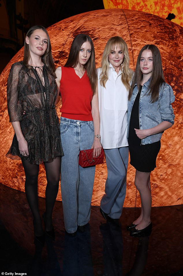 Nicole was supported by her two daughters Sunday, 17, (second left) and Faith, 14, (right) at the show