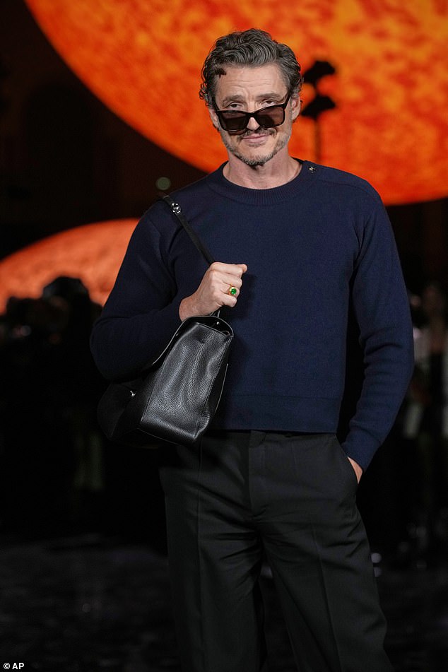 He looked every inch the fashionista at the Chanel show