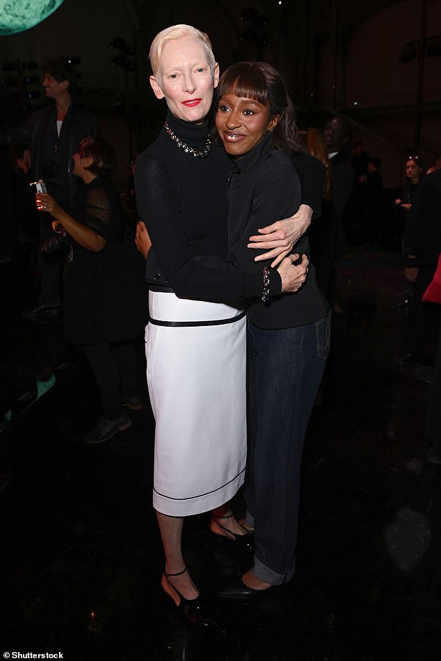 They hugged while posing for the cameras