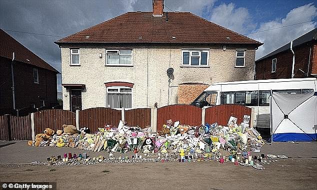 Hundreds of tributes were left outside the house in the wake of the horrific blaze