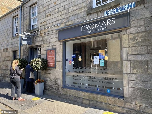 Speaking exclusively to The Daily Mail, the manager of Cromars Fish and Chips, admitted he 'had no idea' the scruffy-looking lad was in fact a pop phenomenon