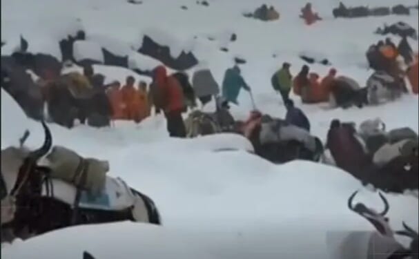 Rescuers finally reach last 200 hikers 16,000ft up on Everest after they were trapped in brutal snowstorm